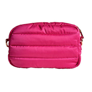 Front view of the ah.dorned Ella Quilted Puffy Zip Top Messenger Bag in the color Hot Pink.