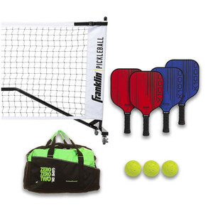 Franklin X-1000 Complete Set includes four composite paddles, two blue and two red, plus three optic yellow outdoor pickleballs, a portable net system with wheels, and a duffle bag for easy equipment management.