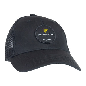 Sleek black Paddletek Trucker Hat with brand patch logo on the front, also in black