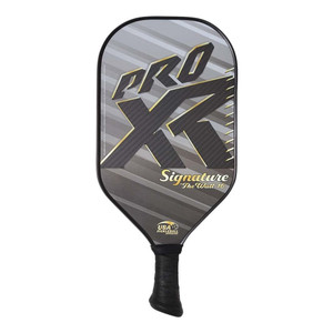 The ProXR Signature "The Wall" 16  Pickleball Paddle features a grey and gold graphic design on a 3k carbon fiber weave face and 16mm poly core. Short 4-inch handle is great for players with a table tennis style grip. Weight ranges from 8.0 - 8.4 ounces.