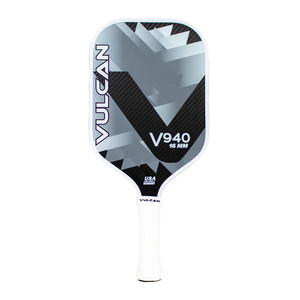 Vulcan V940 Pickleball Paddle featuring a silver and black design on the face with the brand's logo and a white edge guard and grip